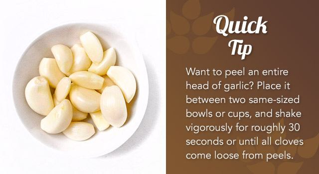 A bowl of garlic cloves with a tip on peeling them quickly by shaking between two bowls.