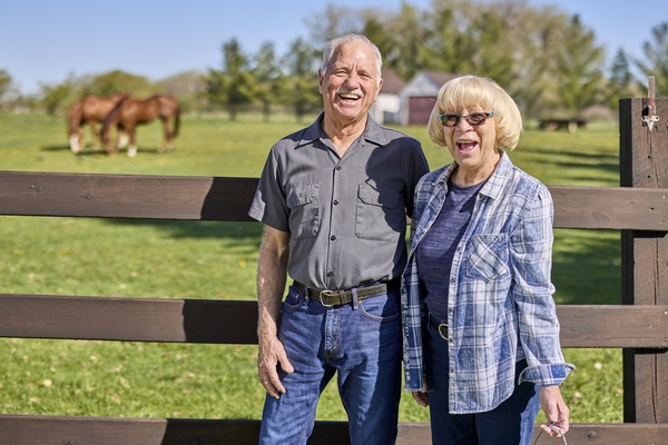 man and woman smiling and laughing