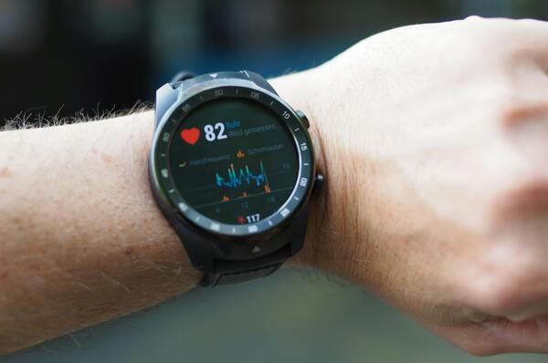 A smart watch monitoring the wearer's heart